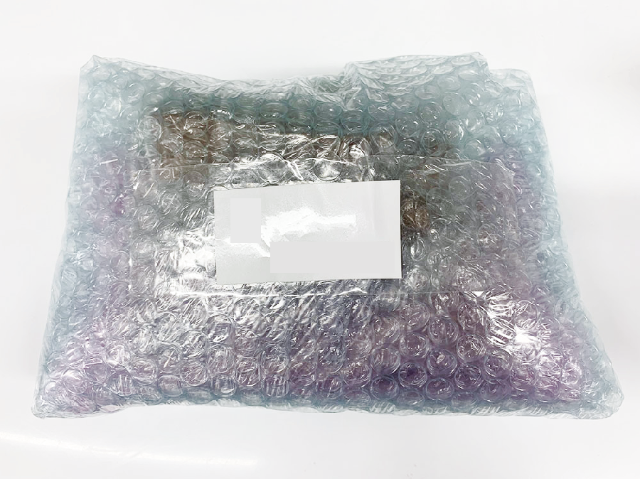 Camera wrapped and sealed in a closed bag with desiccant before storage